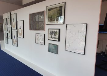 exhibition display framed art display blue carpet gallery